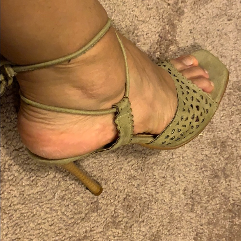 Nude tie up suede heels.